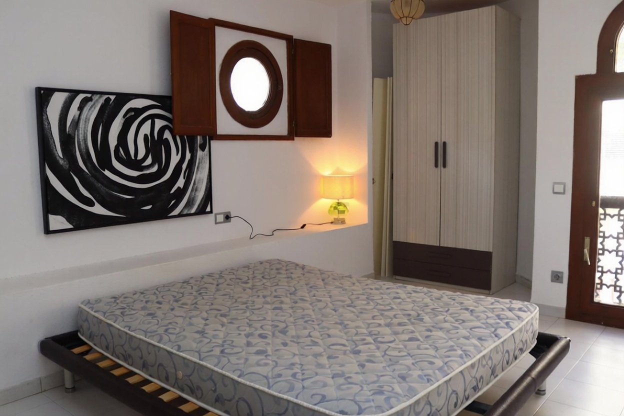 Apartamento em primeira linha de praia em Santa Eulalia del Río — Quarto