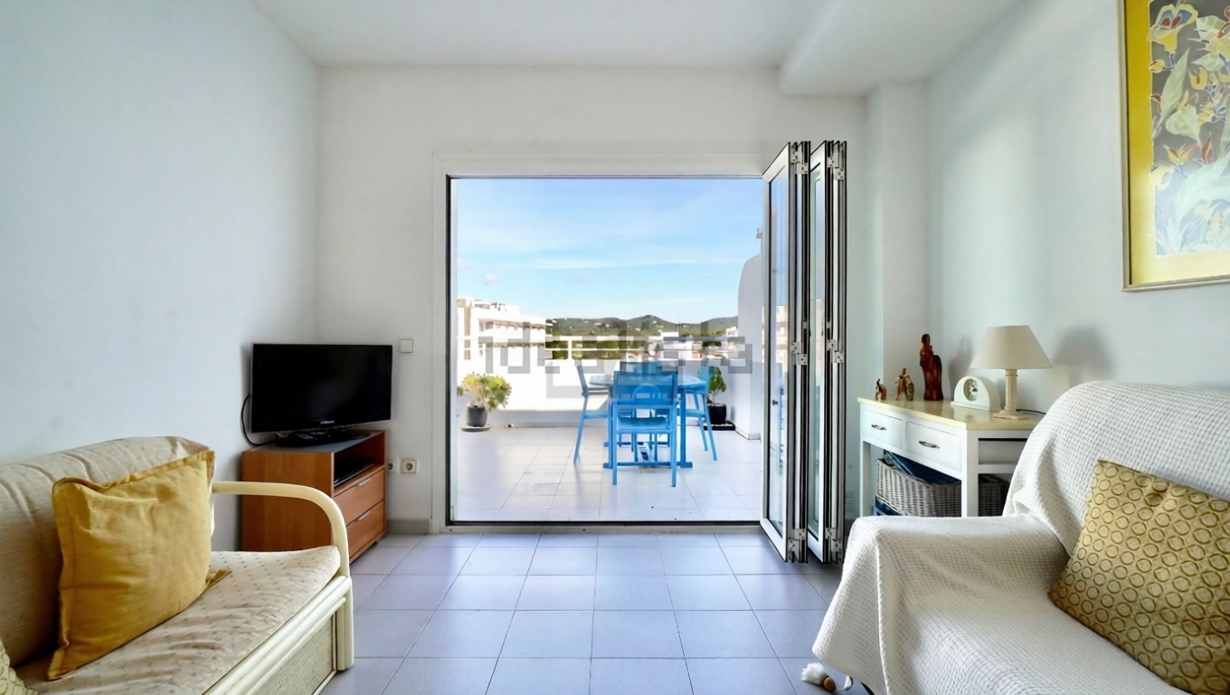 Ático em primeira linha de mar em Santa Eulalia del Río — Sala