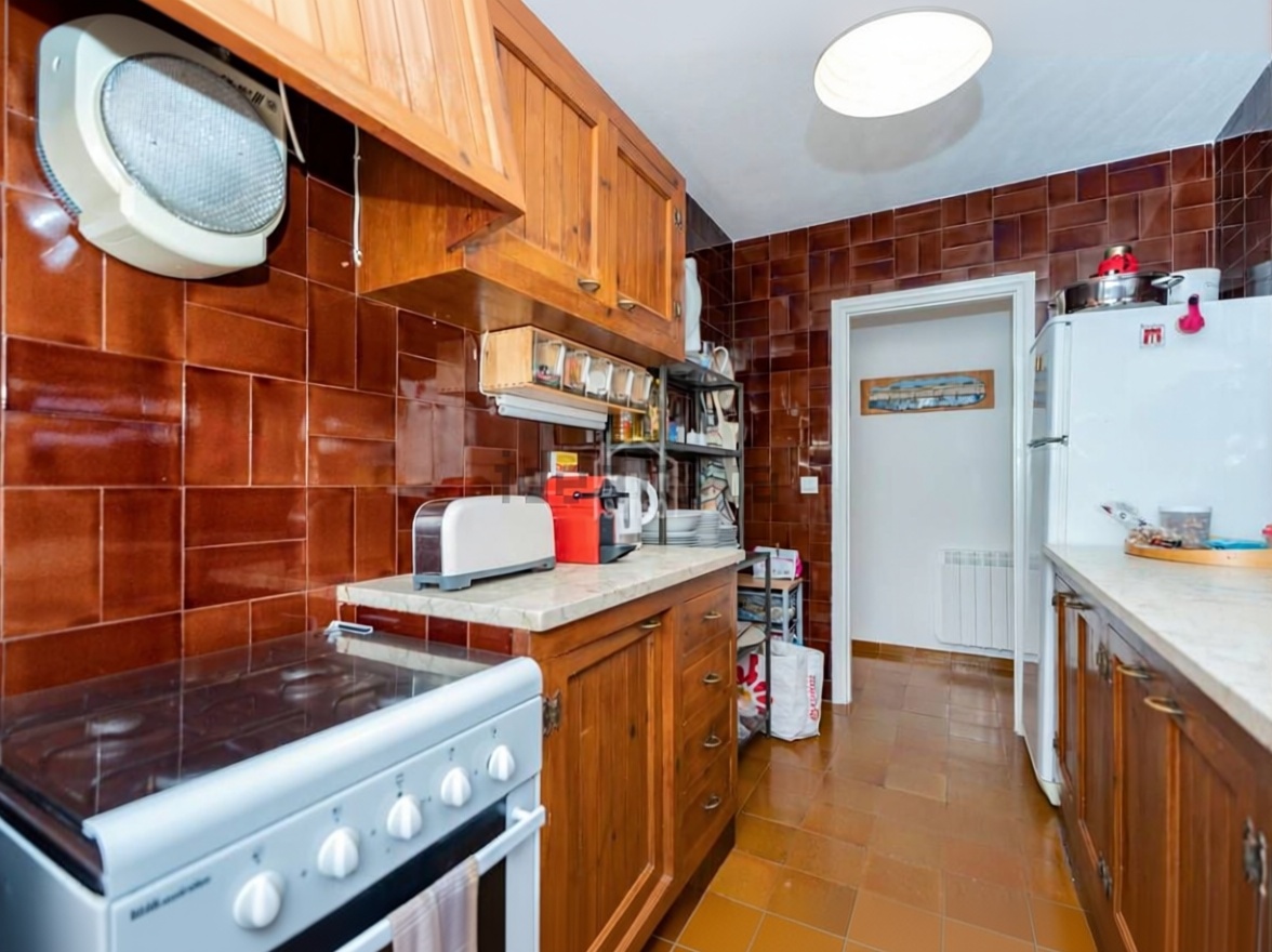Beachfront flat in Es Mercadal — Kitchen