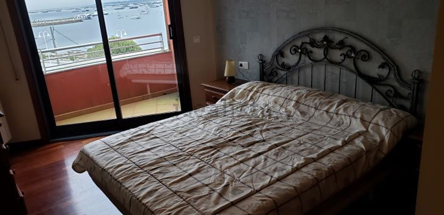 Appartement en attique en première ligne de mer à O Grove — Chambre