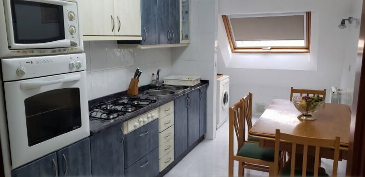 Seafront attic in O Grove — Kitchen
