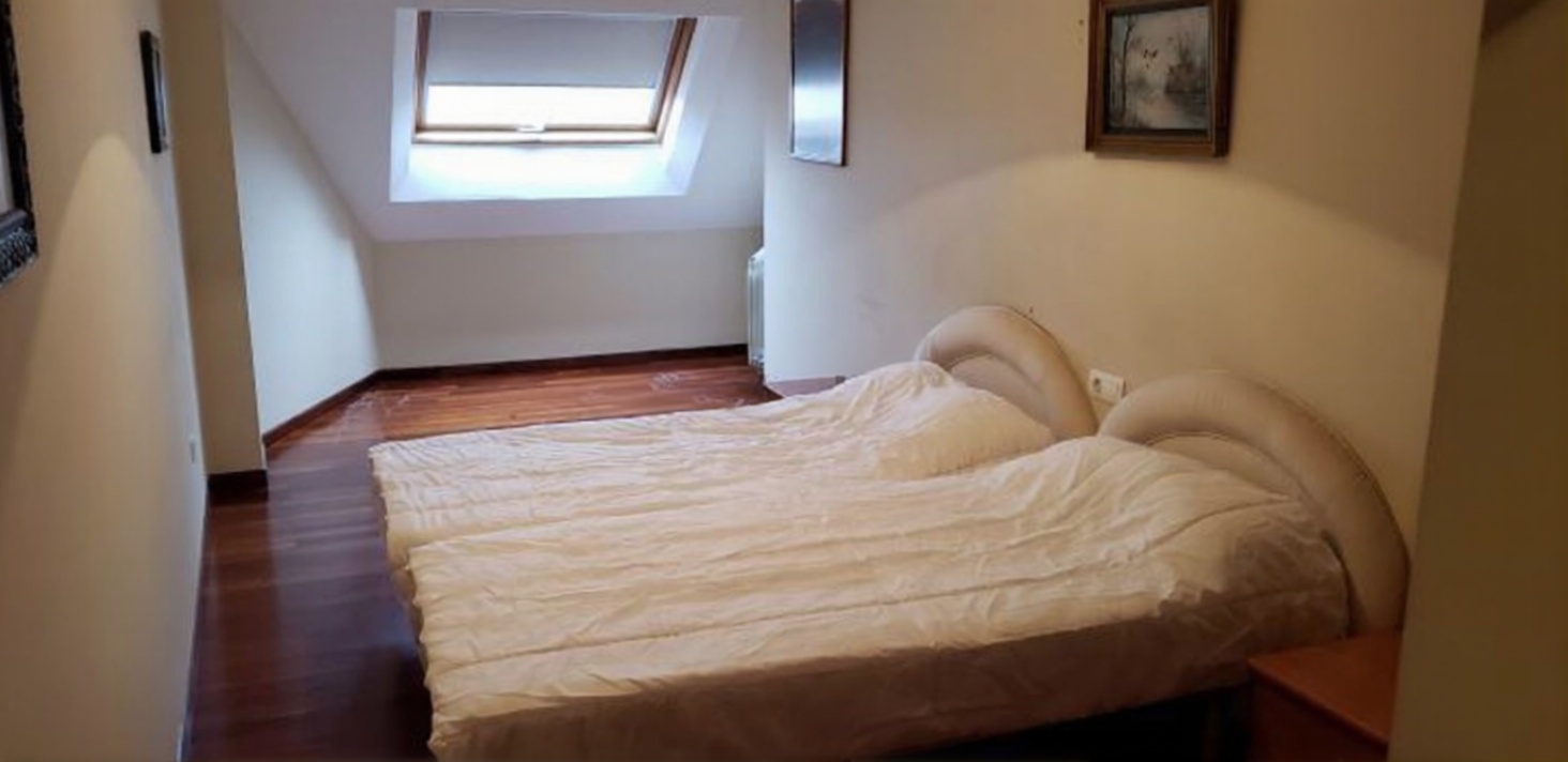 Seafront attic in O Grove — Bedroom