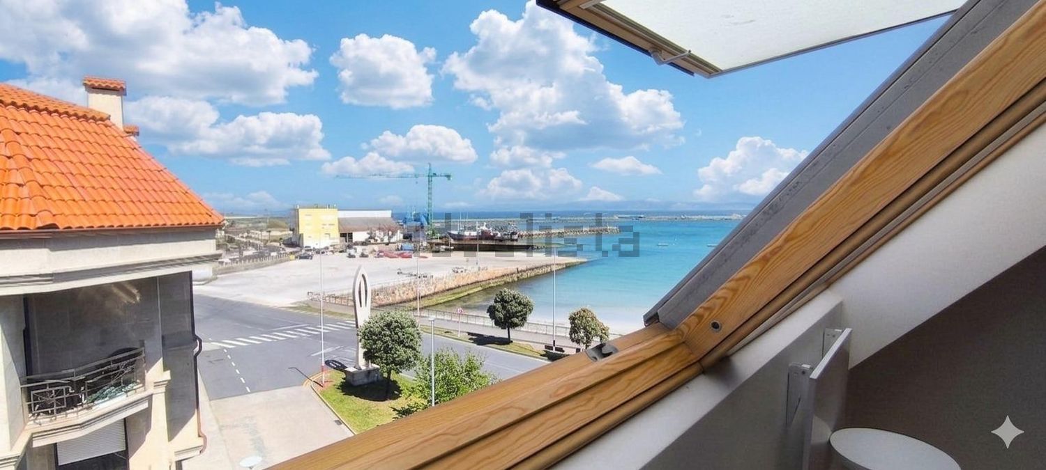 Appartement en première ligne de plage à Ribeira
