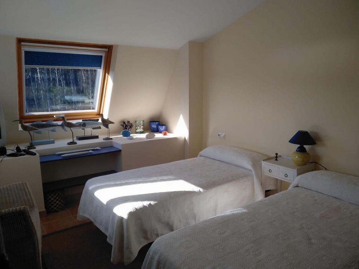 Seafront attic in Cee — Bedroom
