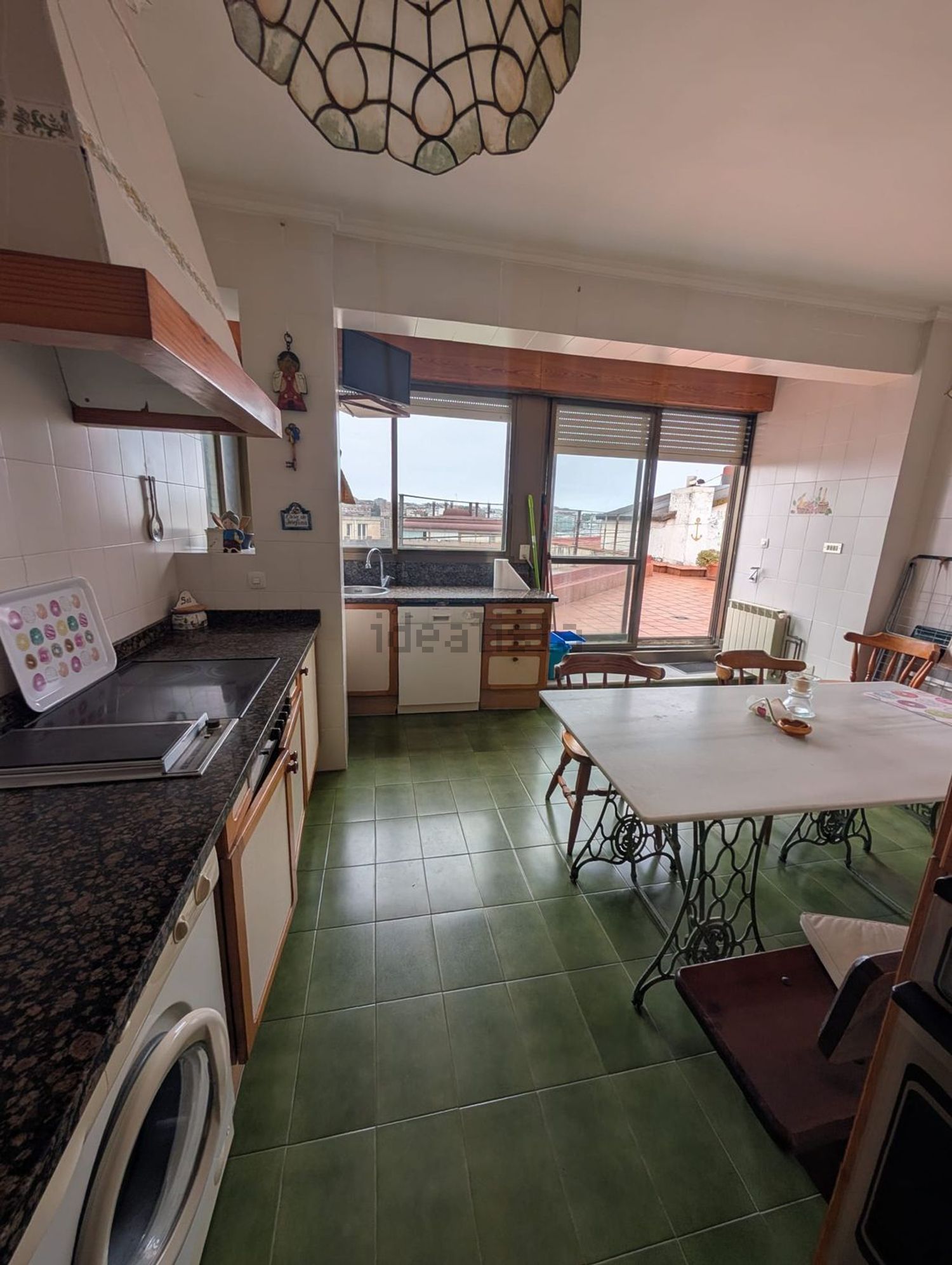 Apartamento em primeira linha de praia em Santander — Cozinha