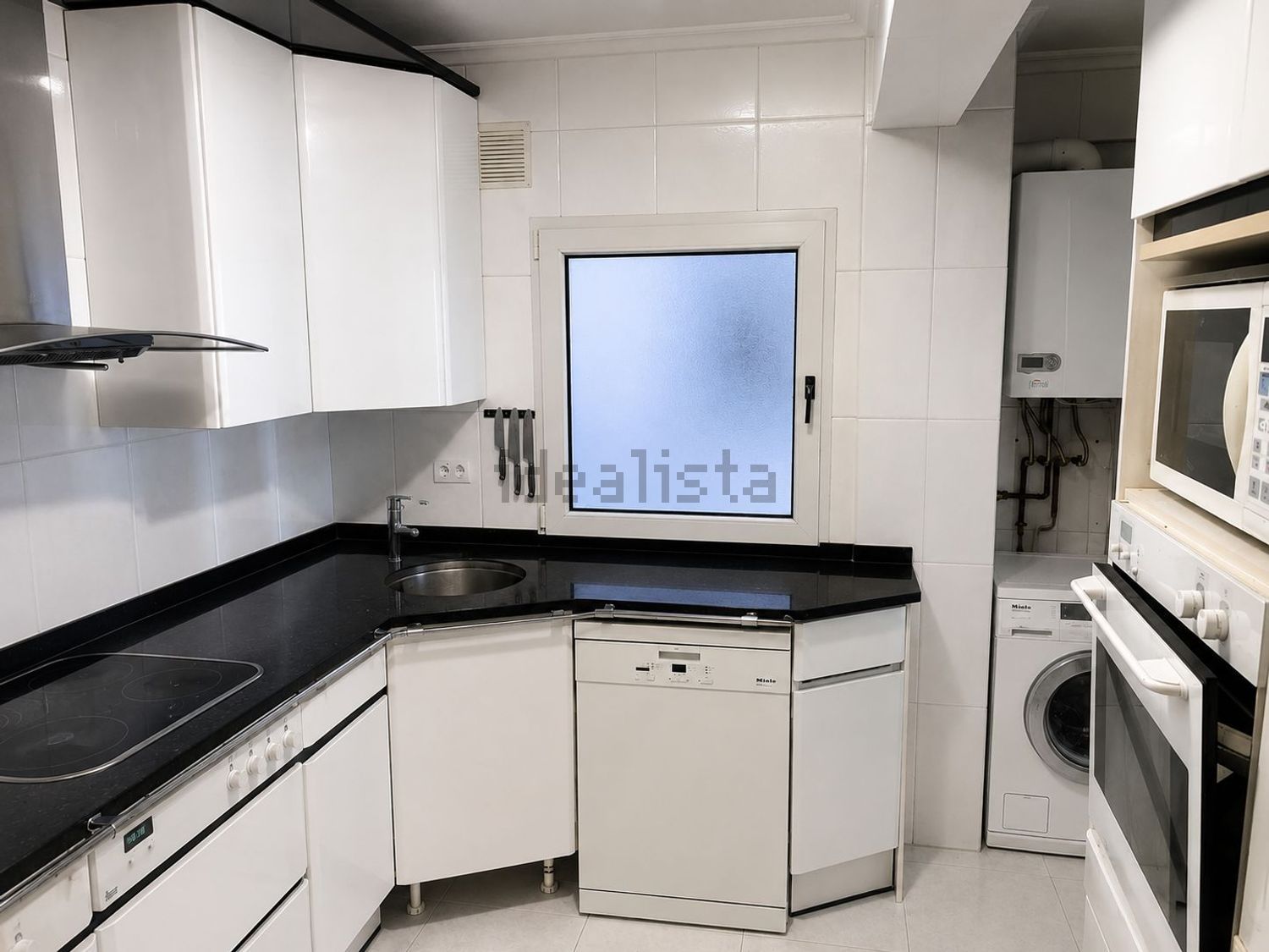 Apartamento em primeira linha de praia em Santander — Cozinha