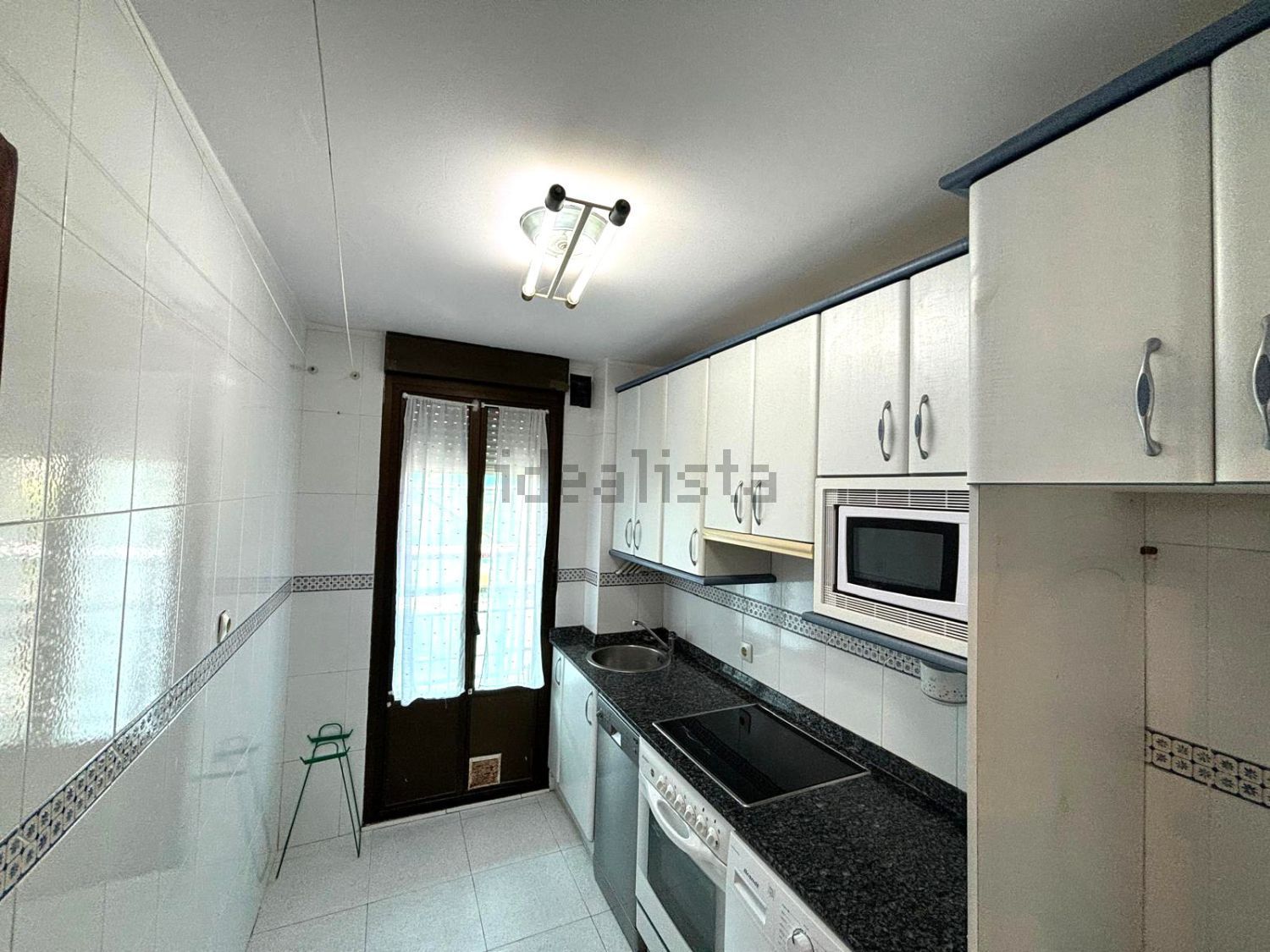 Apartamento em primeira linha de praia em Isla — Cozinha