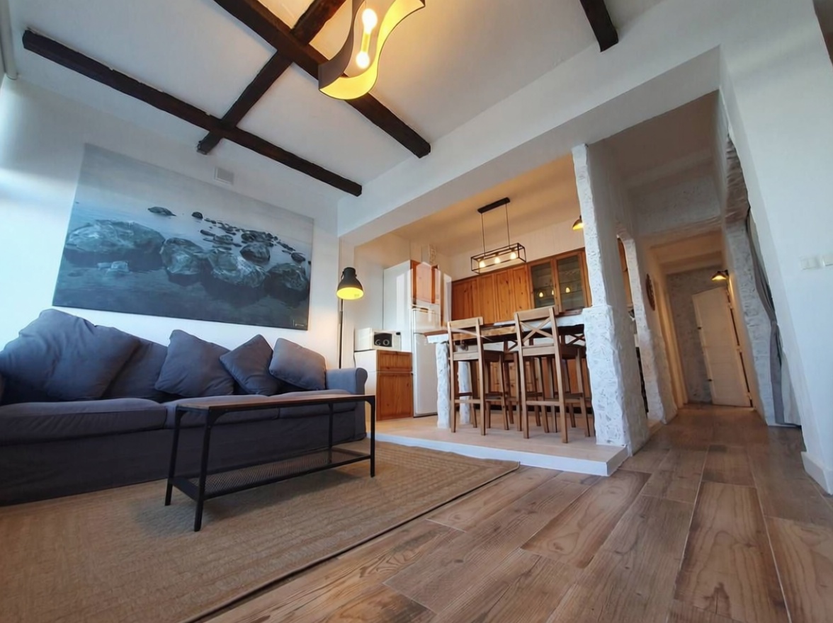 Chalet with direct beach access in Moya — Living room