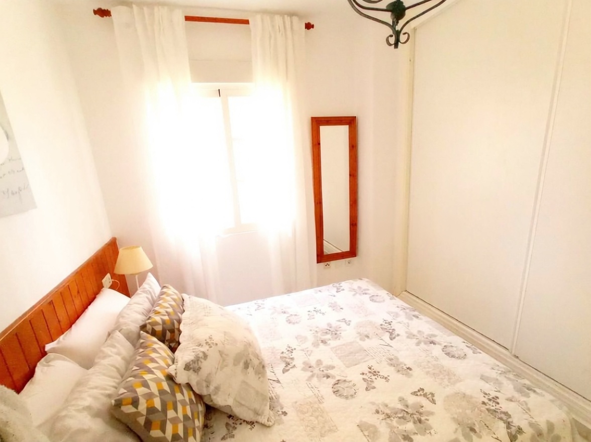Piso en primera línea de playa en Torrox — Dormitorio