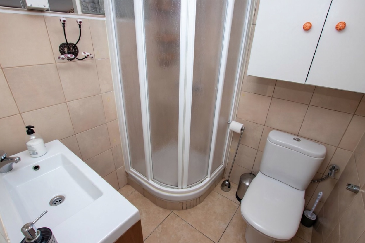 Ático en primera línea de mar en Villajoyosa — Casa banho