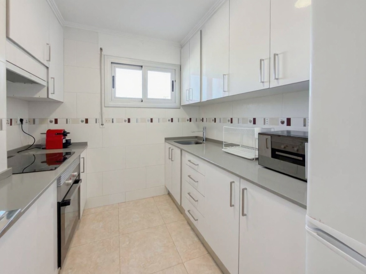 Apartamento em primeira linha de praia em Salou — Cozinha