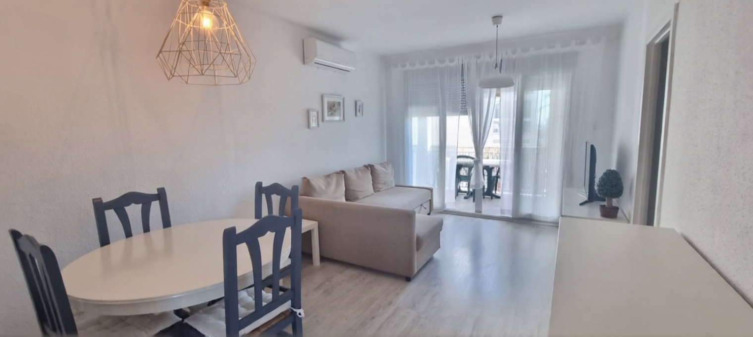 Wohnung in erste Strandlinie in El Perellonet — Wohnzimmer