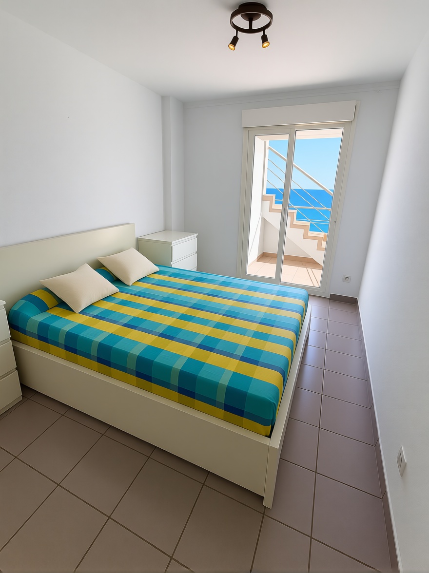 Dúplex en primera línea de playa en Benidorm — Bedroom