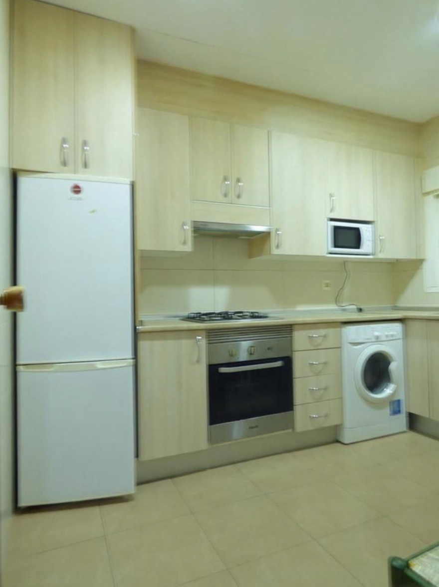 Dúplex en primera línea de playa en Benidorm — Kitchen