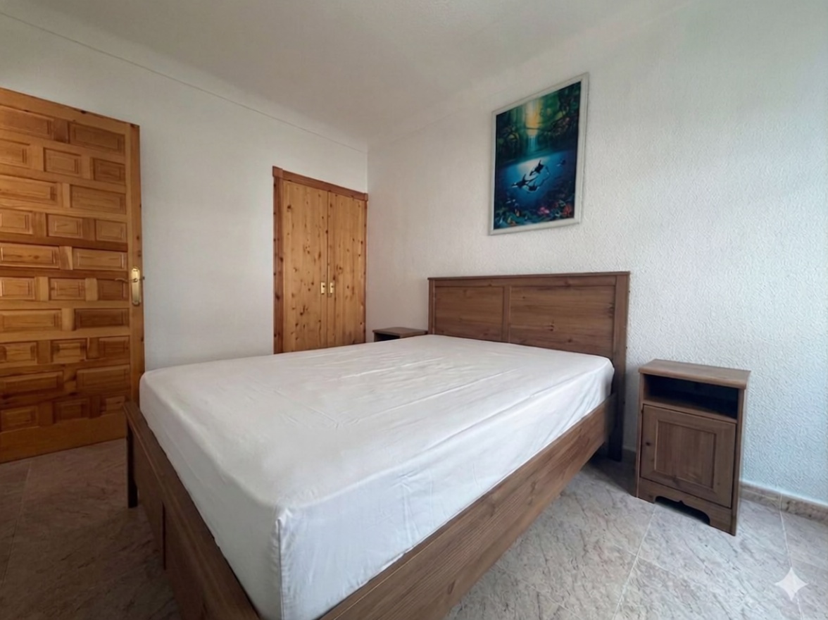 Piso en primera línea de playa en Santa Pola — Dormitorio