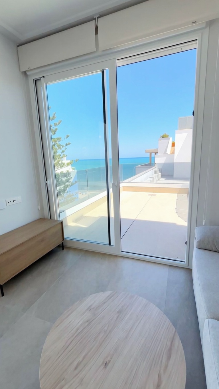 Seafront attic in Torrevieja — Living room