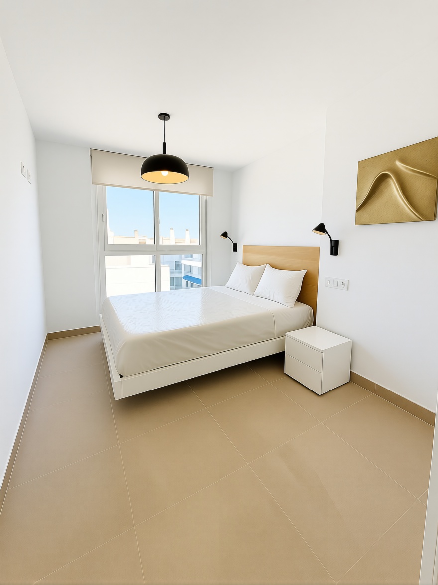 Seafront attic in Torrevieja — Bedroom