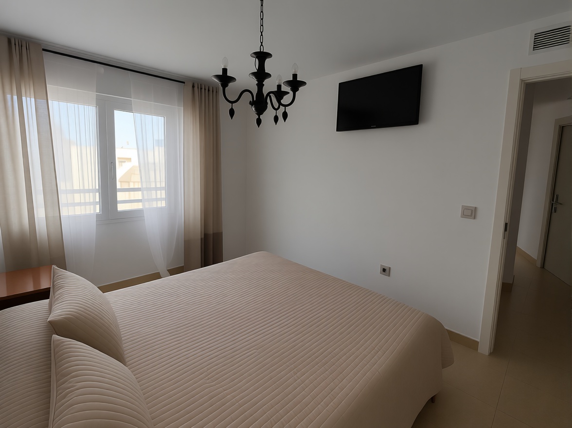 Apartamento em primeira linha de praia em Torrevieja — Quarto