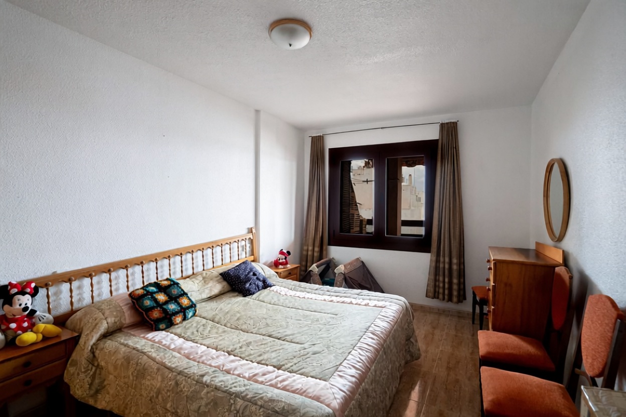 Seafront attic in Torrevieja — Bedroom