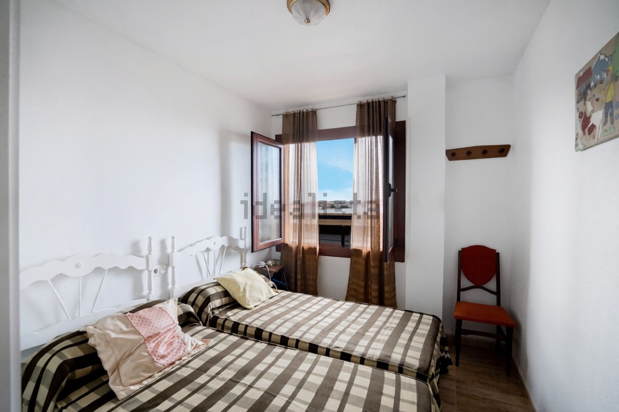 Seafront attic in Torrevieja — Bedroom
