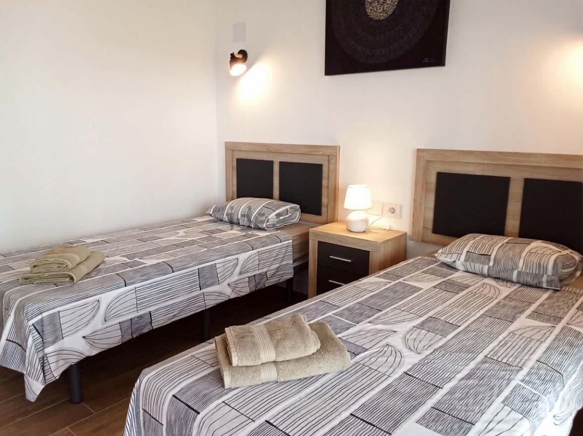 Piso en primera línea de playa en Orihuela Costa — Dormitorio