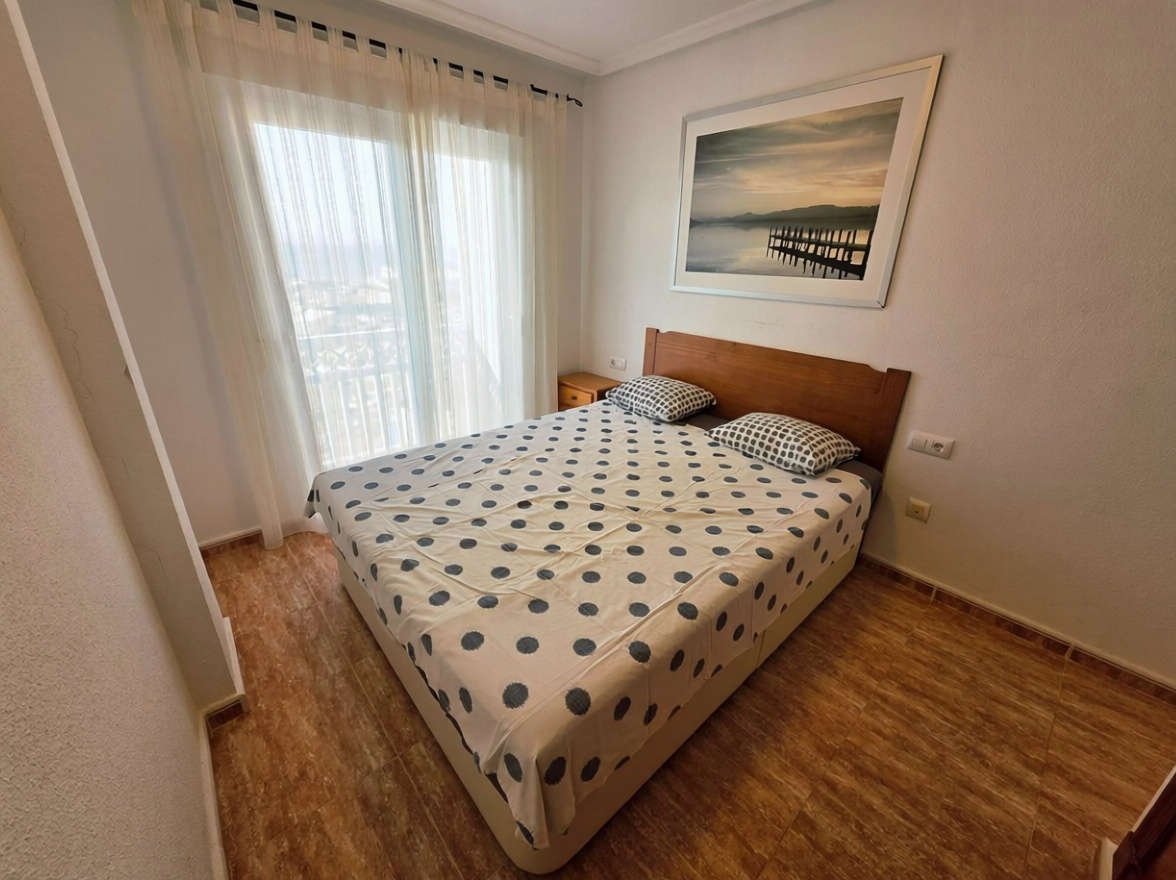 Piso en primera línea de playa en La Manga del Mar Menor — Dormitorio