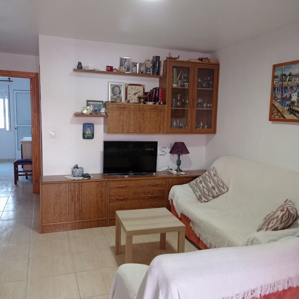 Apartamento em primeira linha de praia em La Manga del Mar Menor — Sala