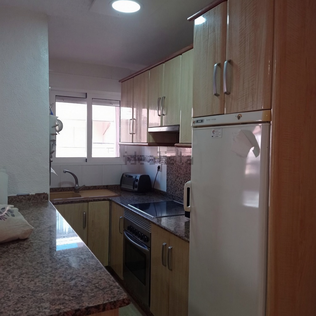 Apartamento em primeira linha de praia em La Manga del Mar Menor — Cozinha