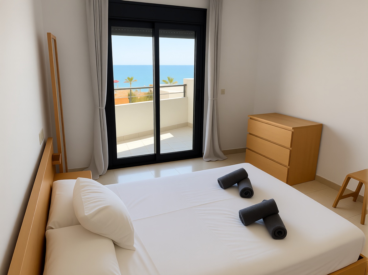 Appartement en première ligne de plage à Roquetas de Mar — Chambre