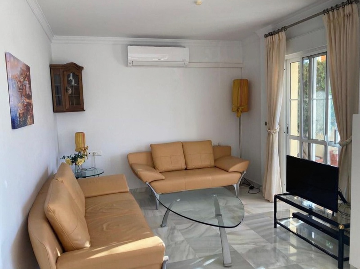 Ático en primera línea de mar en Torrox — Salón