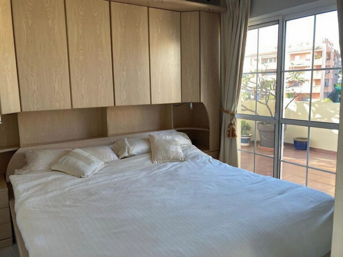 Ático en primera línea de mar en Torrox — Dormitorio