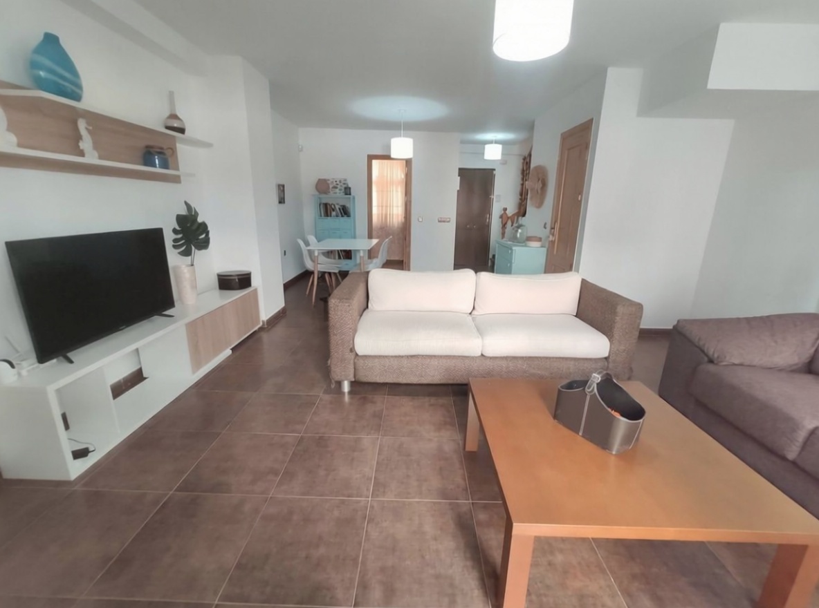 Apartamento em primeira linha de praia em Torrox — Sala