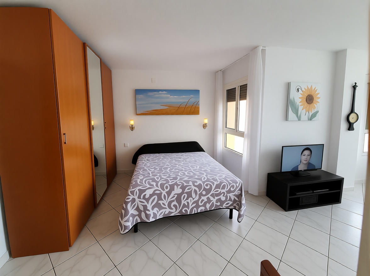 Appartement en attique en première ligne de mer à Torrox — Chambre