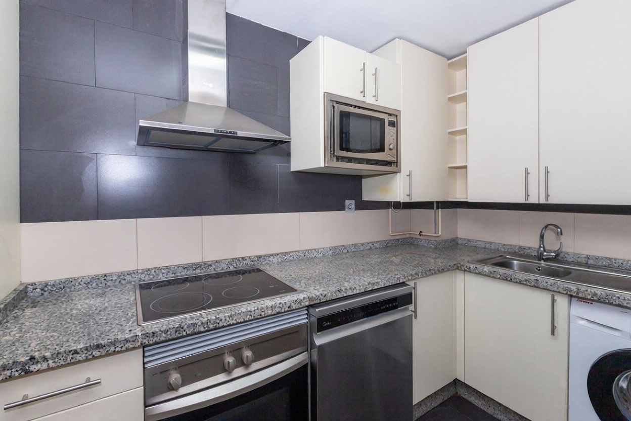 Apartamento em primeira linha de praia em Málaga — Cozinha