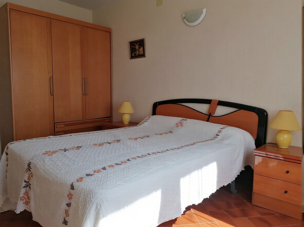 Apartamento em primeira linha de praia em Hospitalet de l'Infant — Quarto