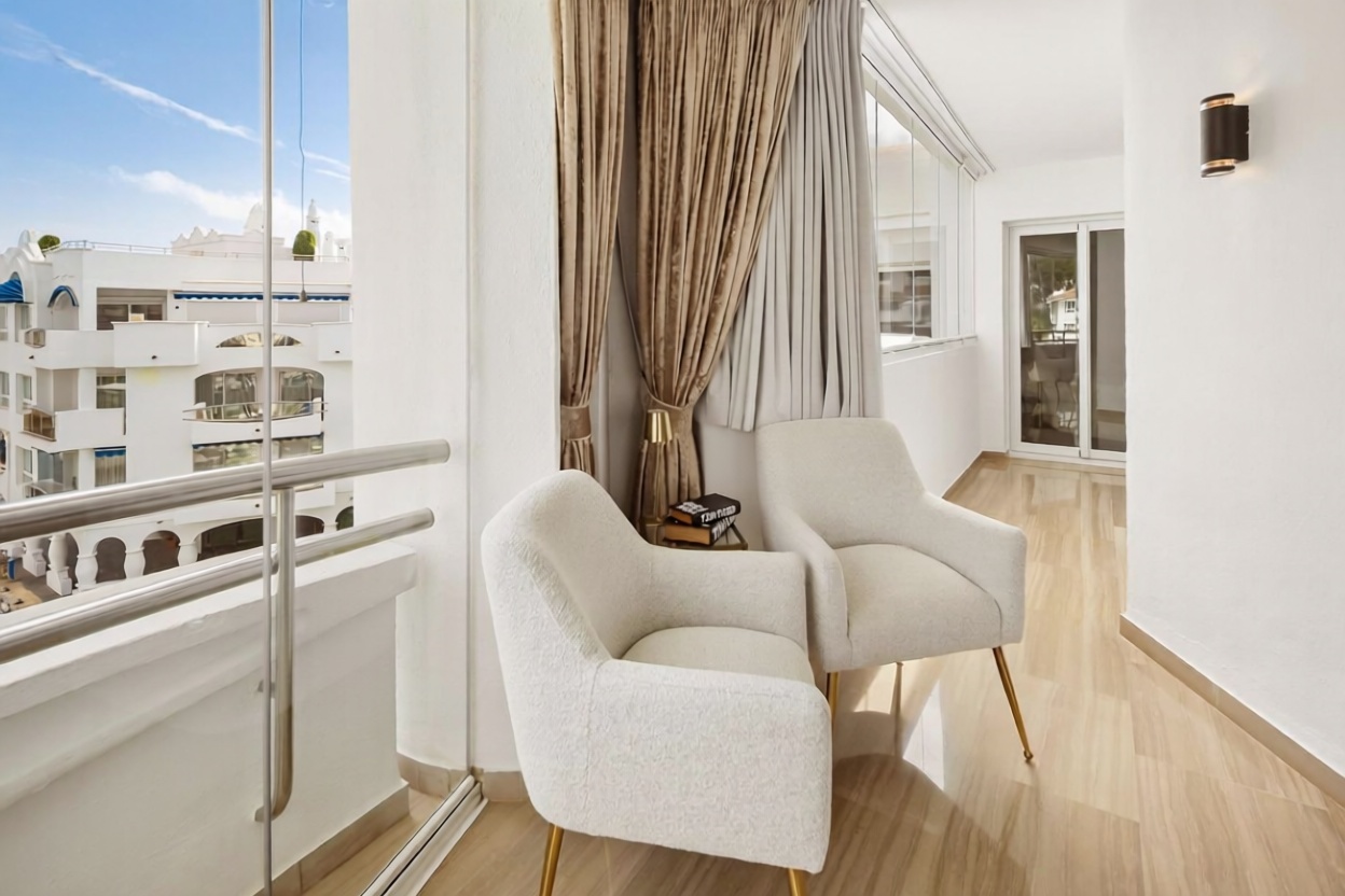 Appartement en attique en première ligne de mer à Benalmádena — Chambre
