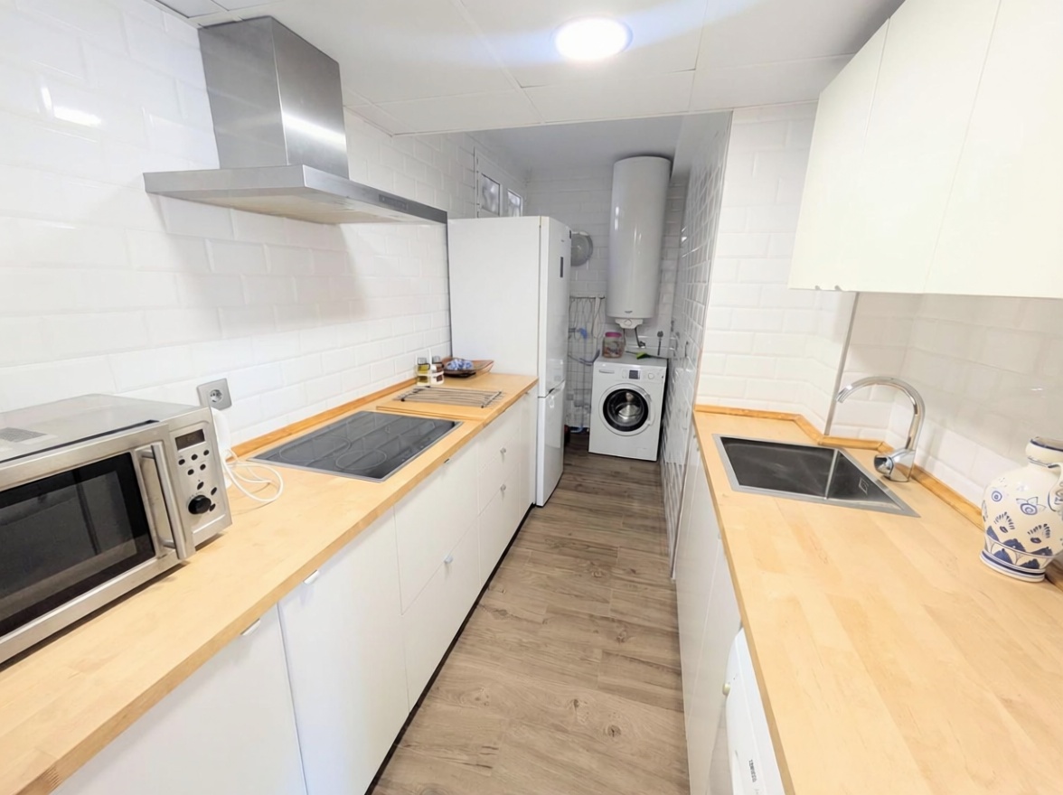 Appartement en attique en première ligne de mer à Benalmádena — Cuisine