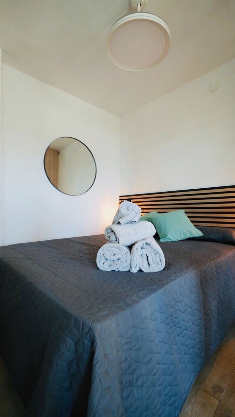Piso en primera línea de playa en Benalmádena — Dormitorio