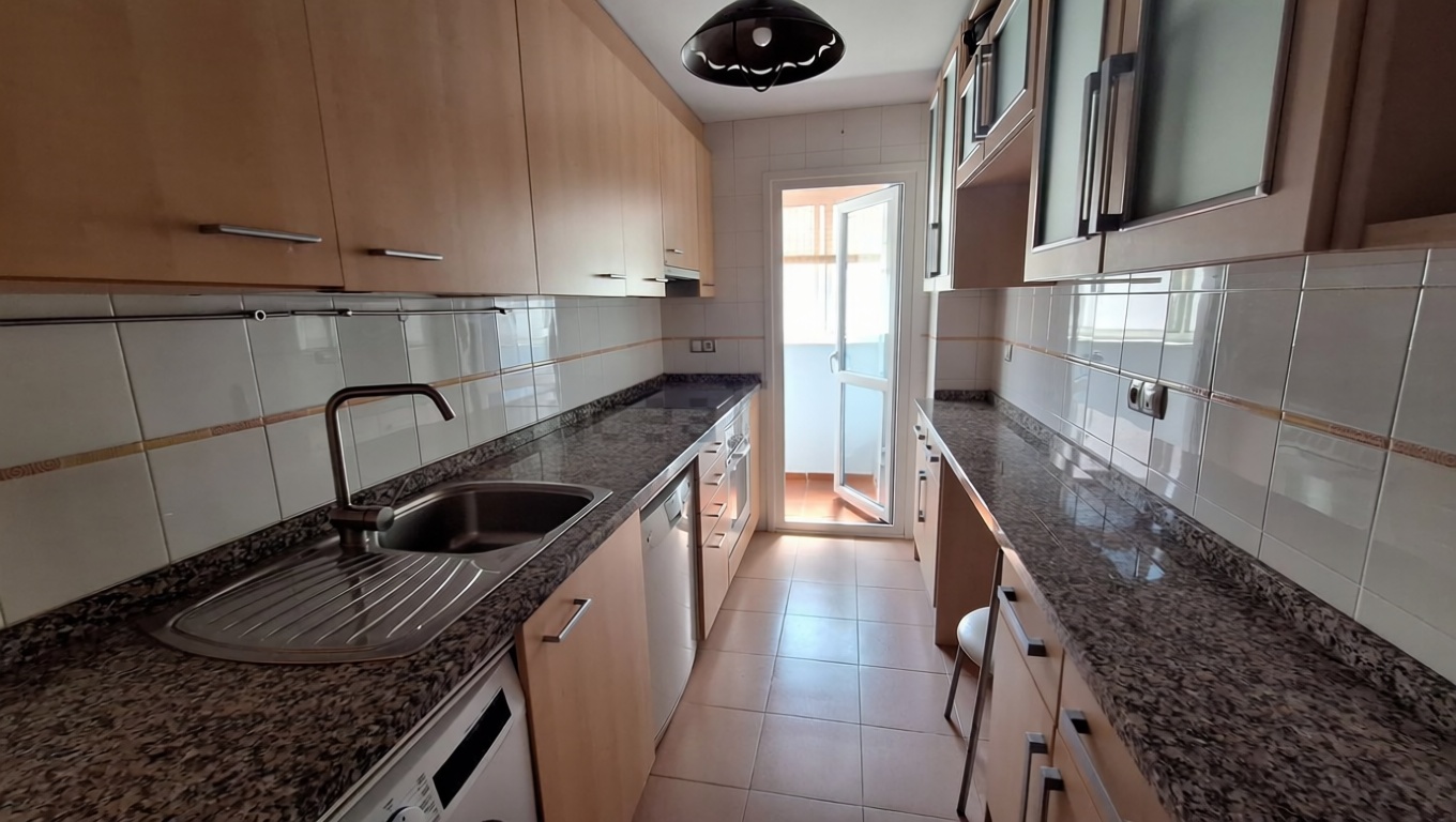 Appartement en attique en première ligne de mer à Manilva — Cuisine