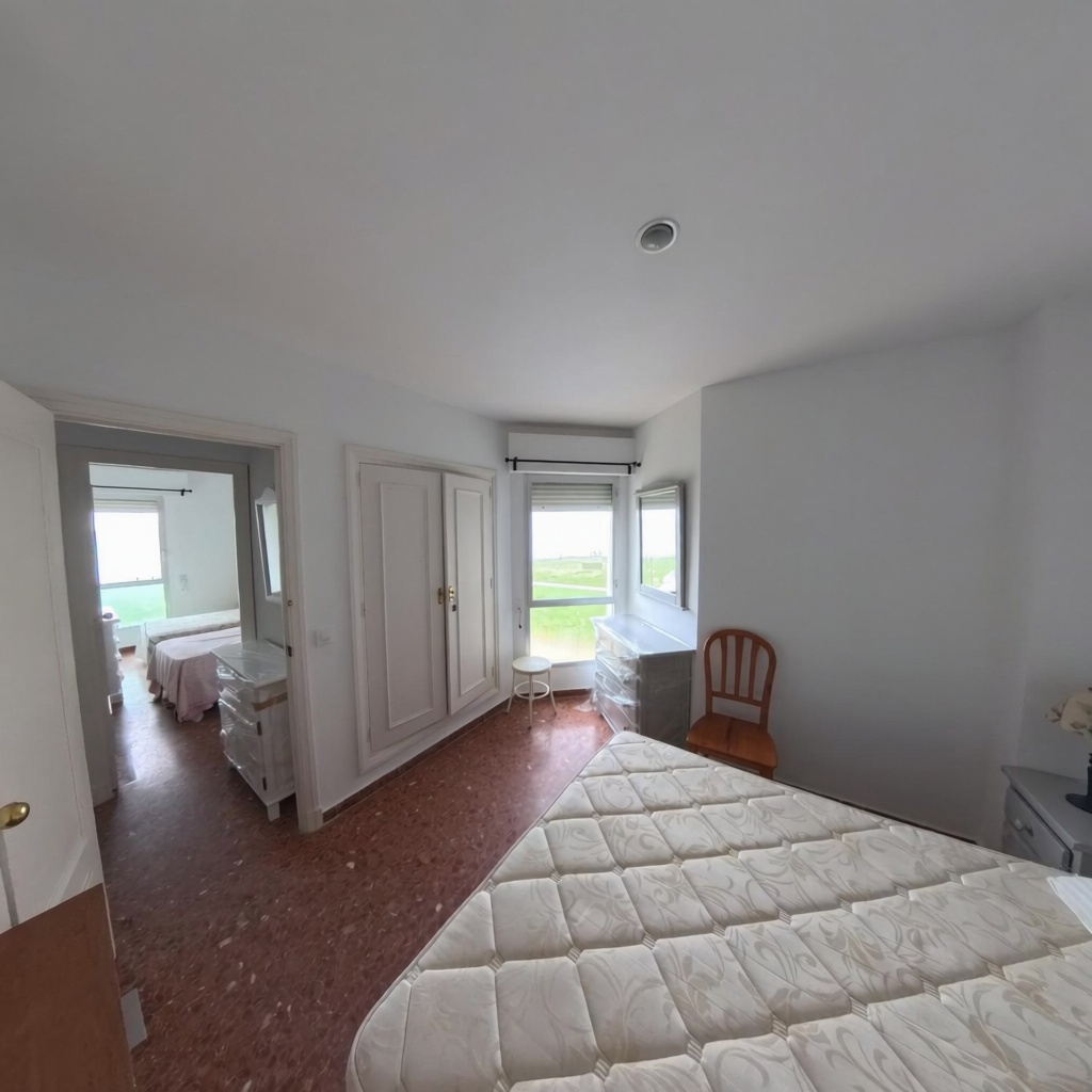 Piso en primera línea de playa en El Puerto de Santa María — Dormitorio