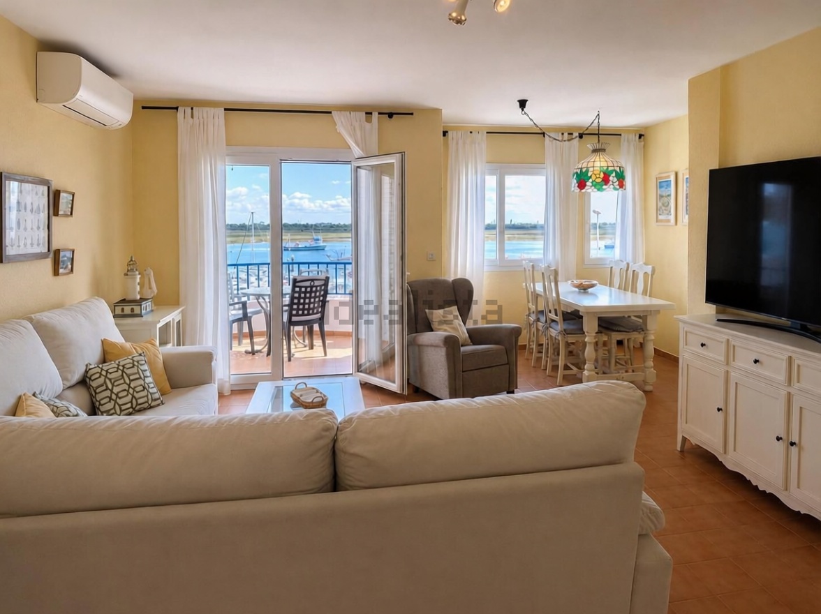 Beachfront flat in Punta Umbría — Living room